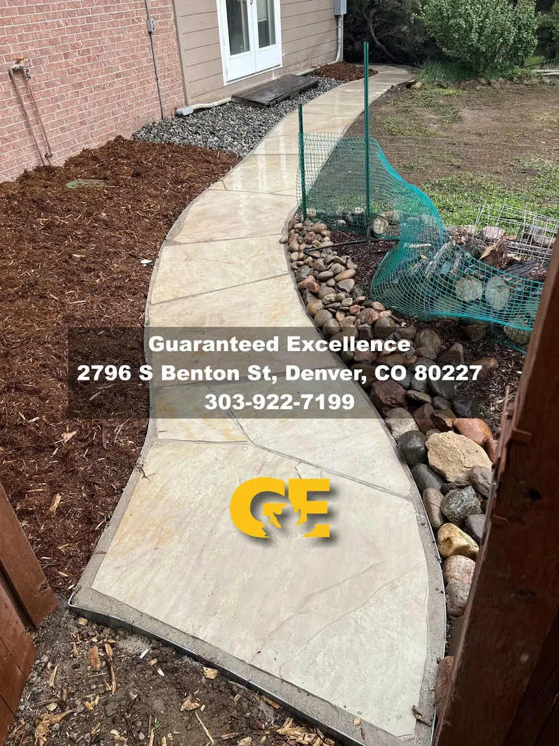 Guaranteed Excellence Landscaping team at work